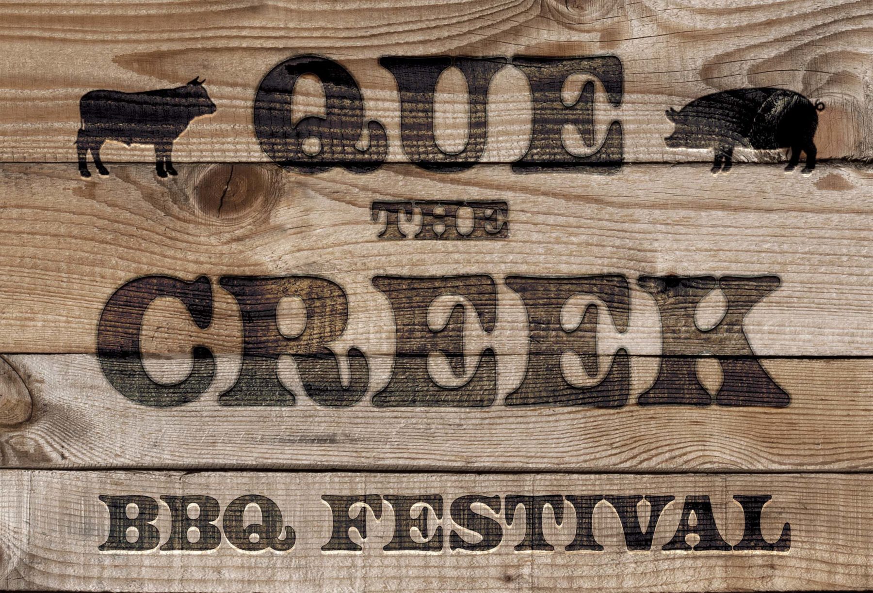 Que the Creek logo